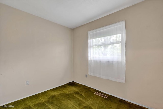 380 Longview Rd, Medina, OH 44256 - spare room featuring dark carpet and baseboards