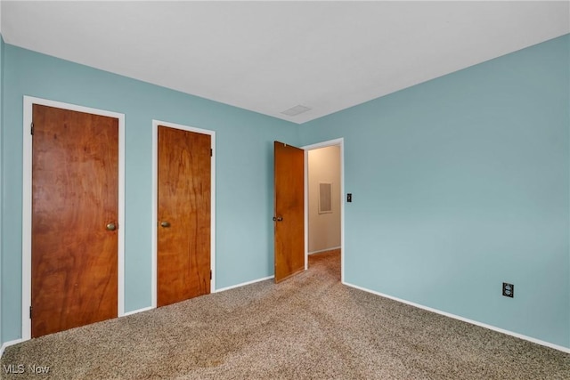 380 Longview Rd, Medina, OH 44256 - unfurnished bedroom featuring carpet flooring and baseboards