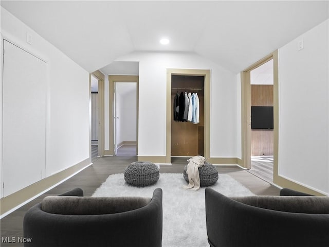 3000 Spitler Rd, Youngstown, OH 44514 - living area with lofted ceiling, wood finished floors, and baseboards