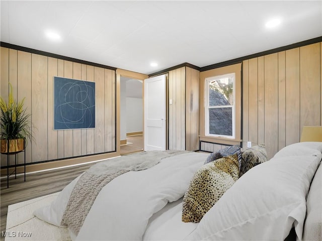 3000 Spitler Rd, Youngstown, OH 44514 - bedroom with wood finished floors, wooden walls, baseboards, and recessed lighting