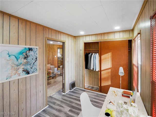 3000 Spitler Rd, Youngstown, OH 44514 - bedroom with wooden walls, wood finished floors, and a closet