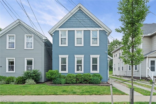 2450 Tremont Ave, Cleveland, OH 44113 - view of front of house with a front yard