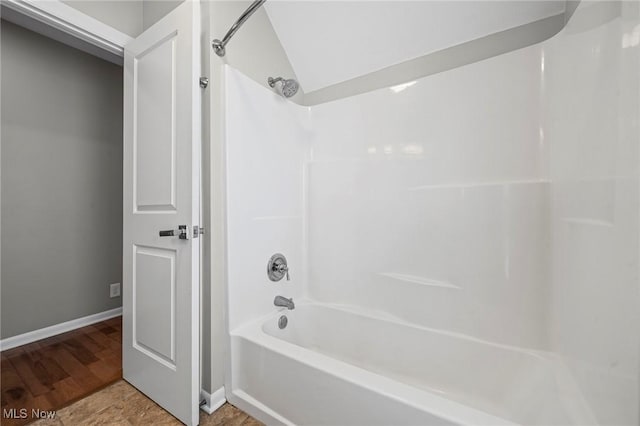 2450 Tremont Ave, Cleveland, OH 44113 - full bathroom with shower / tub combination and vaulted ceiling