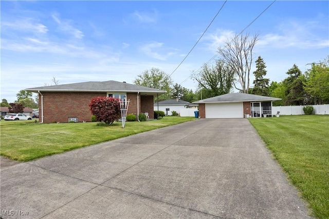 4002 Canterbury Ct, Lorain, OH 44053 - ranch-style house featuring brick siding and a garage