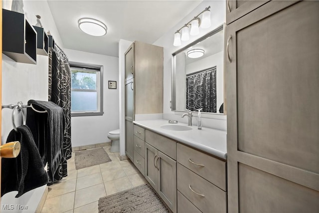 4002 Canterbury Ct, Lorain, OH 44053 - full bathroom featuring toilet, vanity, and tile patterned floors