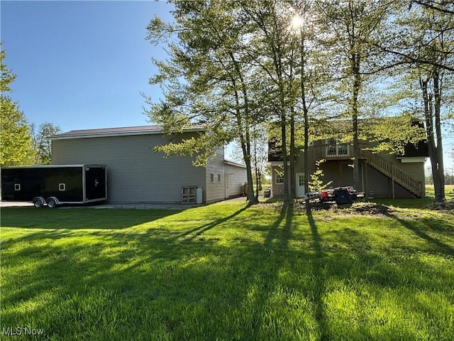 6516 Fee Rd, Rome, OH 44085 - view of grassy yard with stairway