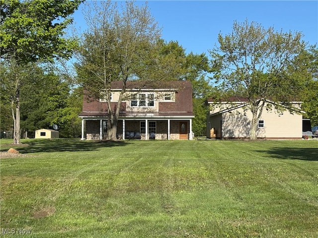 6516 Fee Rd, Rome, OH 44085 - back of property with a yard and a porch