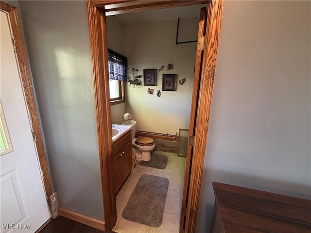 6516 Fee Rd, Rome, OH 44085 - bathroom featuring vanity, toilet, and tile patterned floors