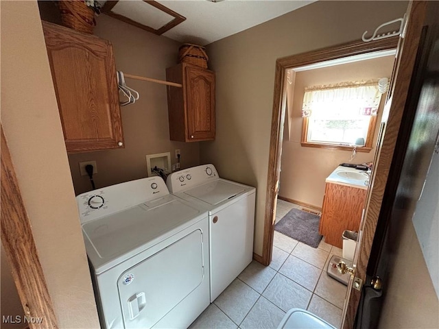 6516 Fee Rd, Rome, OH 44085 - laundry area with cabinet space, washer and clothes dryer, and light tile patterned floors