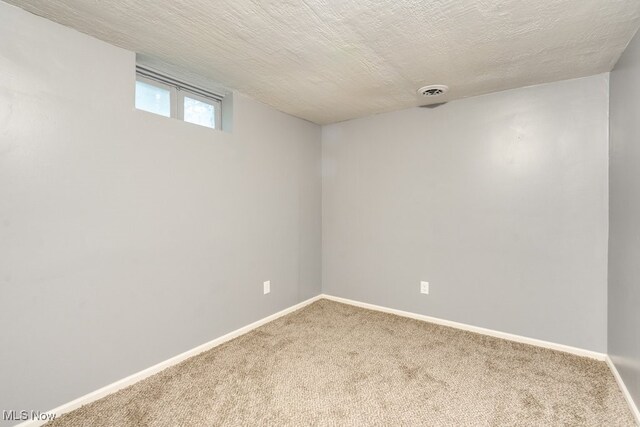 2318 3rd St SE, Canton, OH 44707 - basement featuring carpet flooring and baseboards