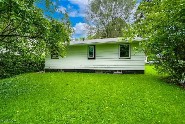 2318 3rd St SE, Canton, OH 44707 - view of side of property featuring a lawn