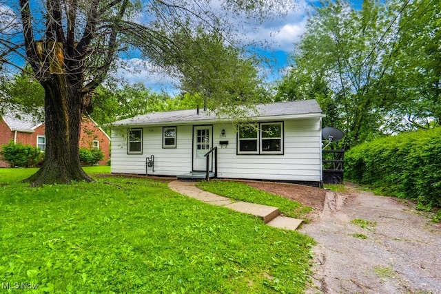2318 3rd St SE, Canton, OH 44707 - view of front of home with a front lawn