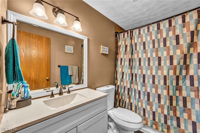 2300 Canterbury Cir, Akron, OH 44319 - bathroom with toilet, vanity, a textured ceiling, and curtained shower