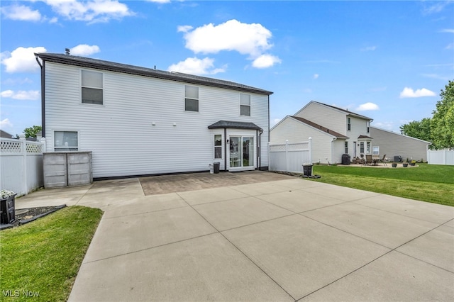 2300 Canterbury Cir, Akron, OH 44319 - rear view of house with a patio