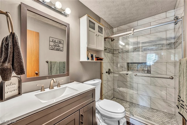 2300 Canterbury Cir, Akron, OH 44319 - full bath with toilet, a stall shower, vanity, and a textured ceiling