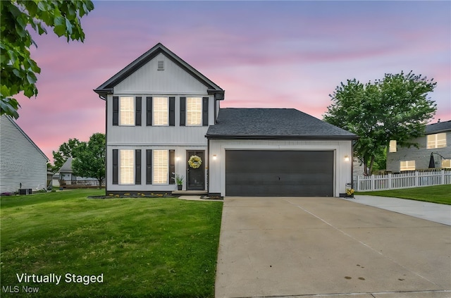 2300 Canterbury Cir, Akron, OH 44319 - view of front of property with a garage, driveway, and roof with shingles