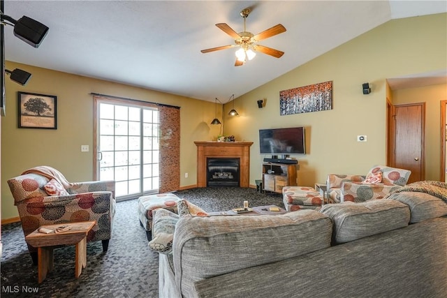 3690 Dornoch Dr, Wooster, OH 44691 - living area with vaulted ceiling, carpet, a ceiling fan, a fireplace, and baseboards
