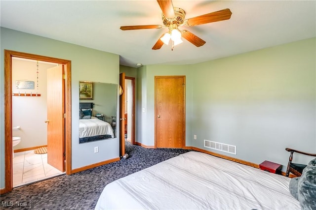 3690 Dornoch Dr, Wooster, OH 44691 - bedroom with baseboards, ensuite bathroom, and ceiling fan