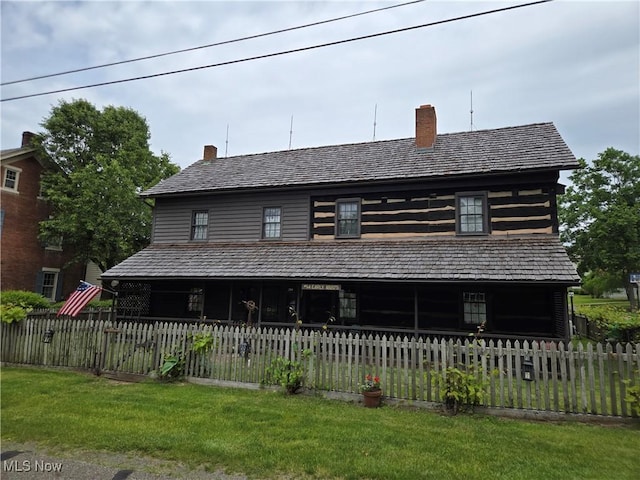 199 E 3rd St, Zoar, OH 44697 - view of front of house featuring a chimney