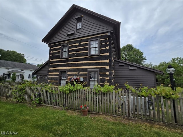 199 E 3rd St, Zoar, OH 44697 - view of front of home featuring log exterior