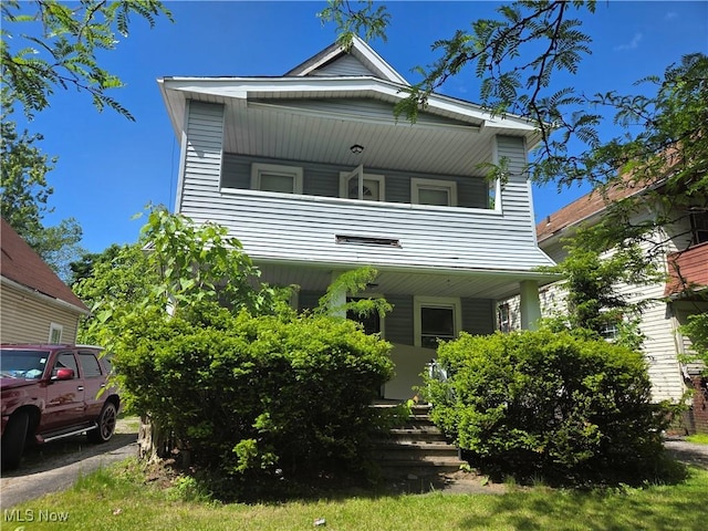 11813 Soika Ave, Cleveland, OH 44120 - view of front of property featuring a balcony and covered porch