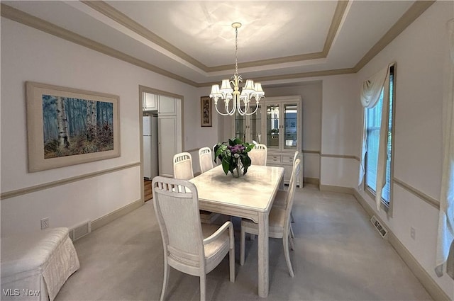 592 Charles Pl, Highland Heights, OH 44143 - dining area with a chandelier, a raised ceiling, and baseboards
