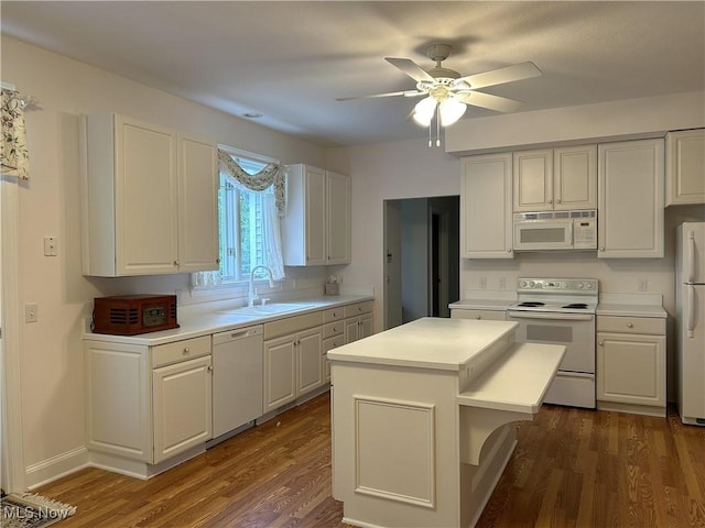 592 Charles Pl, Highland Heights, OH 44143 - kitchen featuring white appliances, a sink, light countertops, a ceiling fan, and dark wood-type flooring