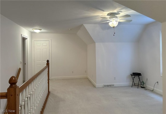 592 Charles Pl, Highland Heights, OH 44143 - bonus room with light carpet, lofted ceiling, a ceiling fan, and baseboards