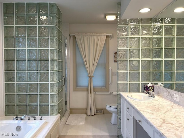 592 Charles Pl, Highland Heights, OH 44143 - bathroom with a shower stall, tile patterned floors, toilet, a bath, and vanity