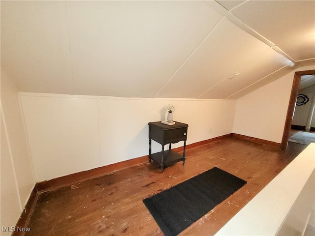 3524 State Rd, Ashtabula, OH 44004 - bonus room featuring wood-type flooring, lofted ceiling, and baseboards