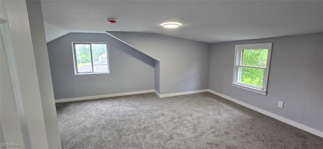 809 4th St, Brilliant, OH 43913 - bonus room featuring carpet flooring, healthy amount of natural light, vaulted ceiling, and baseboards