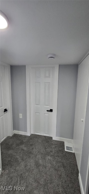 809 4th St, Brilliant, OH 43913 - below grade area with carpet flooring and baseboards