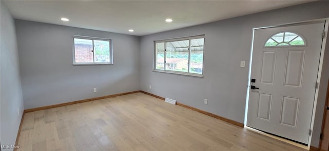 809 4th St, Brilliant, OH 43913 - foyer featuring plenty of natural light, light wood-type flooring, and recessed lighting