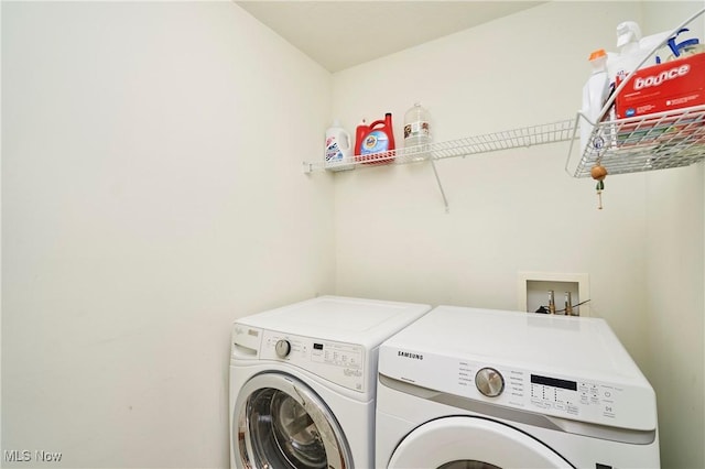 3563 Saint Andrews Ln, Richfield, OH 44286 - laundry room with washer and clothes dryer