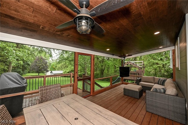 3576 Ellen Dr, Akron, OH 44312 - wooden deck featuring ceiling fan and an outdoor hangout area