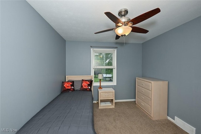 3576 Ellen Dr, Akron, OH 44312 - carpeted bedroom featuring ceiling fan