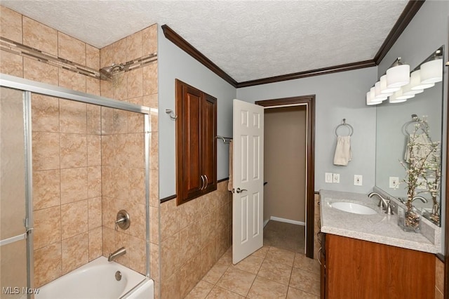 3576 Ellen Dr, Akron, OH 44312 - bathroom featuring tile patterned floors, shower / bath combination with glass door, vanity, a textured ceiling, and ornamental molding