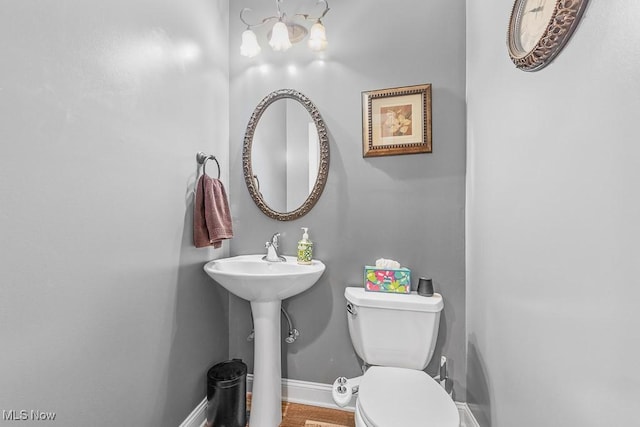 5215 Kapok Dr, Medina, OH 44256 - bathroom featuring toilet, baseboards, and a sink
