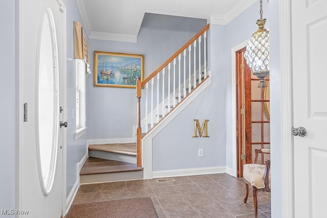 5215 Kapok Dr, Medina, OH 44256 - entryway featuring crown molding, stairs, and baseboards