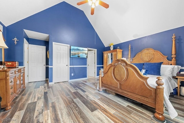 5215 Kapok Dr, Medina, OH 44256 - bedroom with high vaulted ceiling, wood finished floors, and ceiling fan