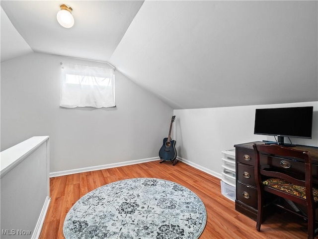 4482 Ranchview Ave, North Olmsted, OH 44070 - home office with wood finished floors, vaulted ceiling, and baseboards