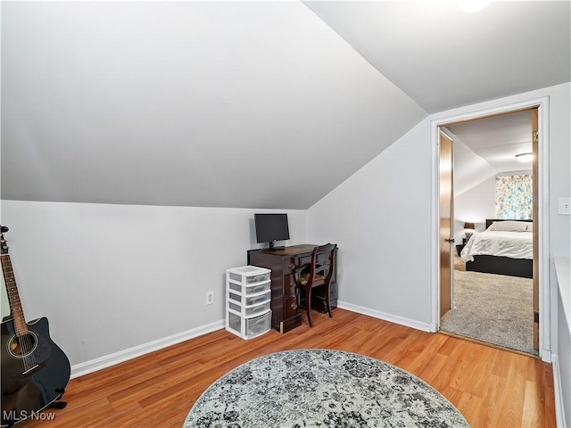 4482 Ranchview Ave, North Olmsted, OH 44070 - office space featuring wood finished floors, vaulted ceiling, and baseboards
