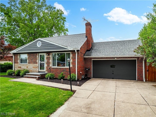 4482 Ranchview Ave, North Olmsted, OH 44070 - view of front of property with concrete driveway, a garage, a front lawn, and brick siding