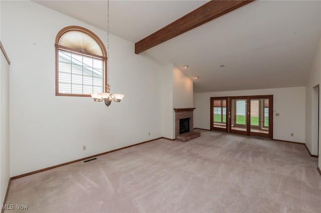 14250 Reserve Ln, Middleburg Heights, OH 44130 - unfurnished living room with light colored carpet, a fireplace, baseboards, and a chandelier