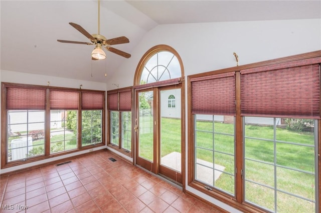 14250 Reserve Ln, Middleburg Heights, OH 44130 - unfurnished sunroom featuring tile patterned floors and high vaulted ceiling