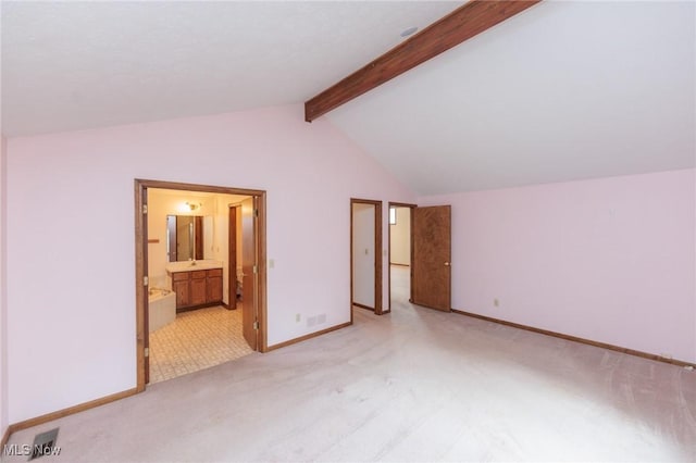 14250 Reserve Ln, Middleburg Heights, OH 44130 - unfurnished bedroom featuring light carpet, baseboards, and connected bathroom