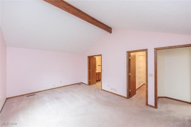 14250 Reserve Ln, Middleburg Heights, OH 44130 - unfurnished bedroom with light carpet, baseboards, and connected bathroom