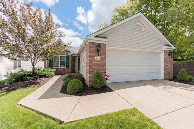 14250 Reserve Ln, Middleburg Heights, OH 44130 - ranch-style home with brick siding, concrete driveway, and an attached garage
