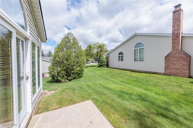 14250 Reserve Ln, Middleburg Heights, OH 44130 - view of grassy yard with french doors