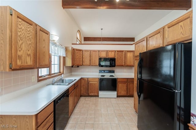 14250 Reserve Ln, Middleburg Heights, OH 44130 - kitchen with black appliances, a sink, decorative backsplash, and light tile patterned floors